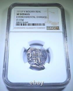 NGC XF 1711 Spanish Bolivia 1 Reales Colonial 1700's Pirate Treasure Cob Coin
